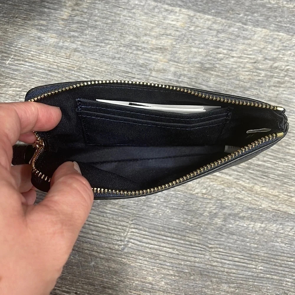 Coach corner zip
